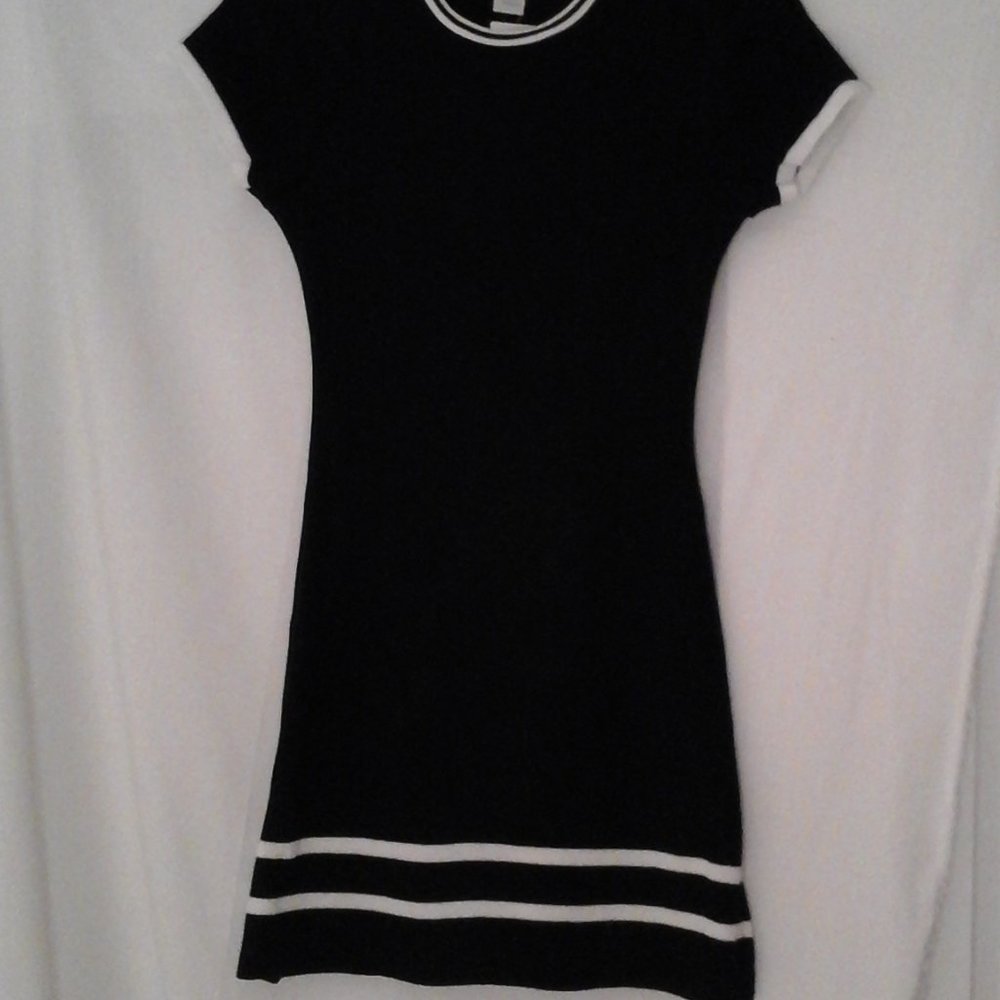 Women's black knit dress with white accent stripes